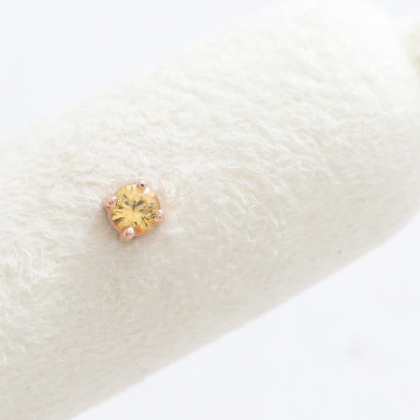 0.1ct Yellow Sapphire 4 Prongs Piercing