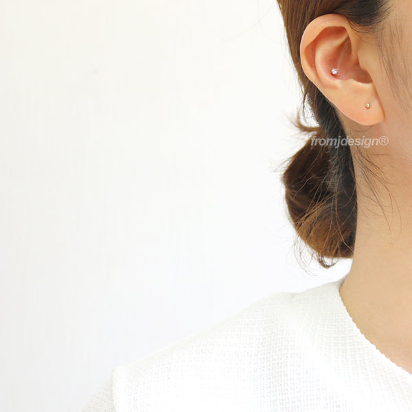 Tiny Dotted Ball Ear Piercing