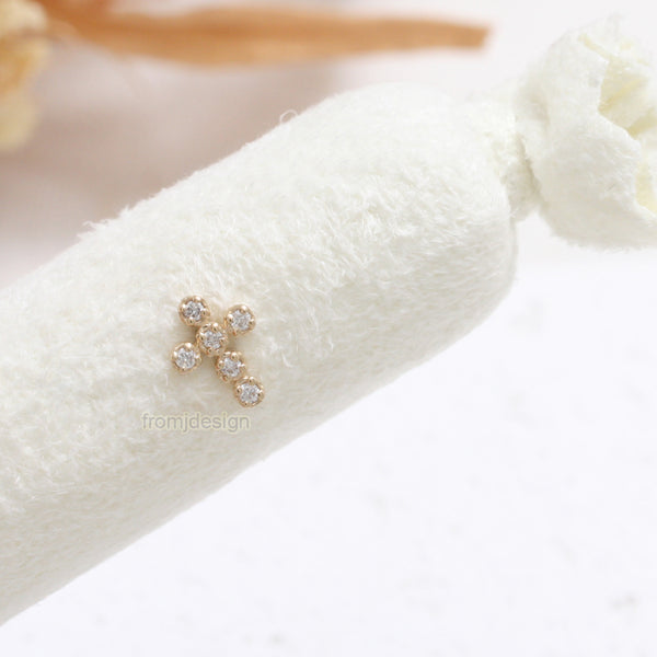 Diamond Cross Ear Piercing