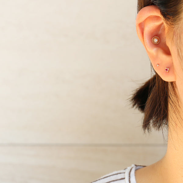 Ruby Rhombus Ear Piercing