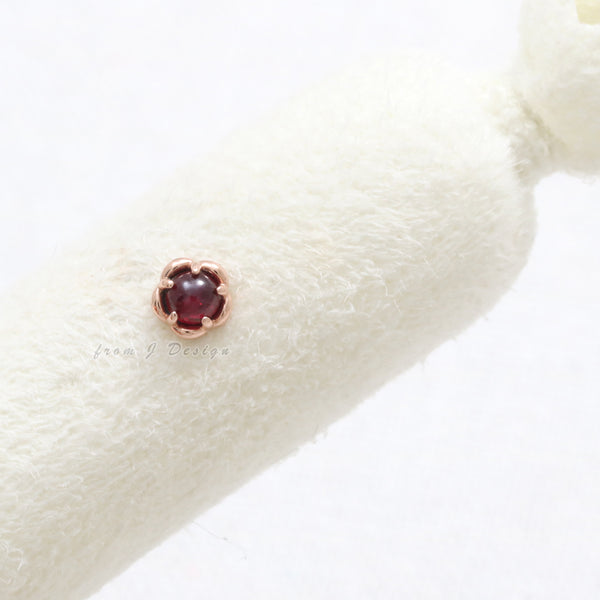 Ruby Flower Ear Piercing