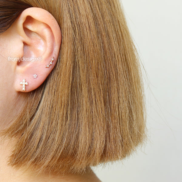 Pearl Cross Ear Piercing