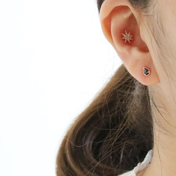 Black Diamond Teardrop Ear Piercing